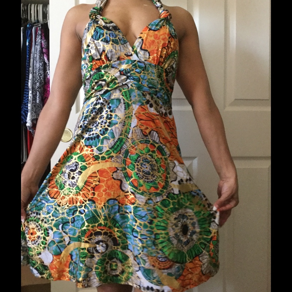 Women mini multi colour shiny dress .