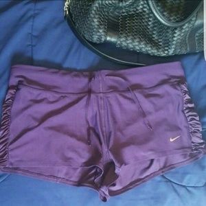 Purple Nike shorts
