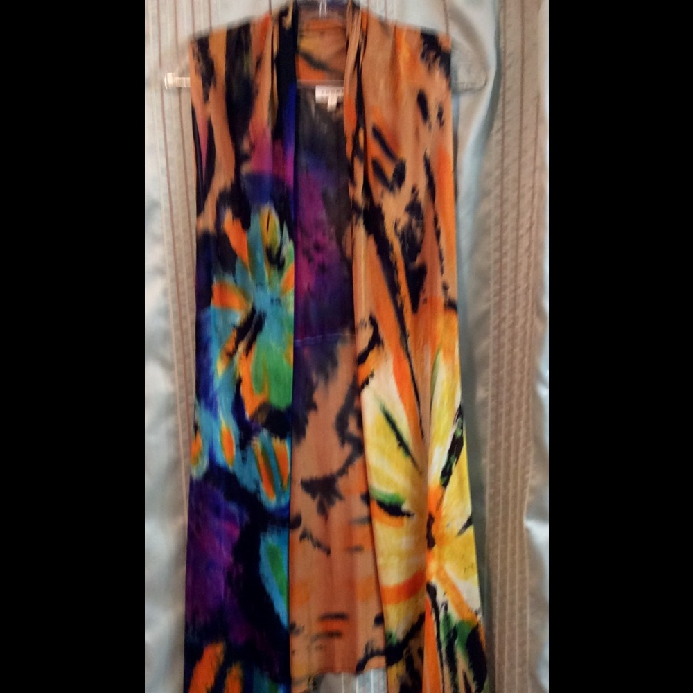 Gorgeous sleeveless asymmetrical cardigan