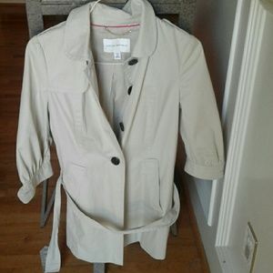 Short Trench coat falls just over hips