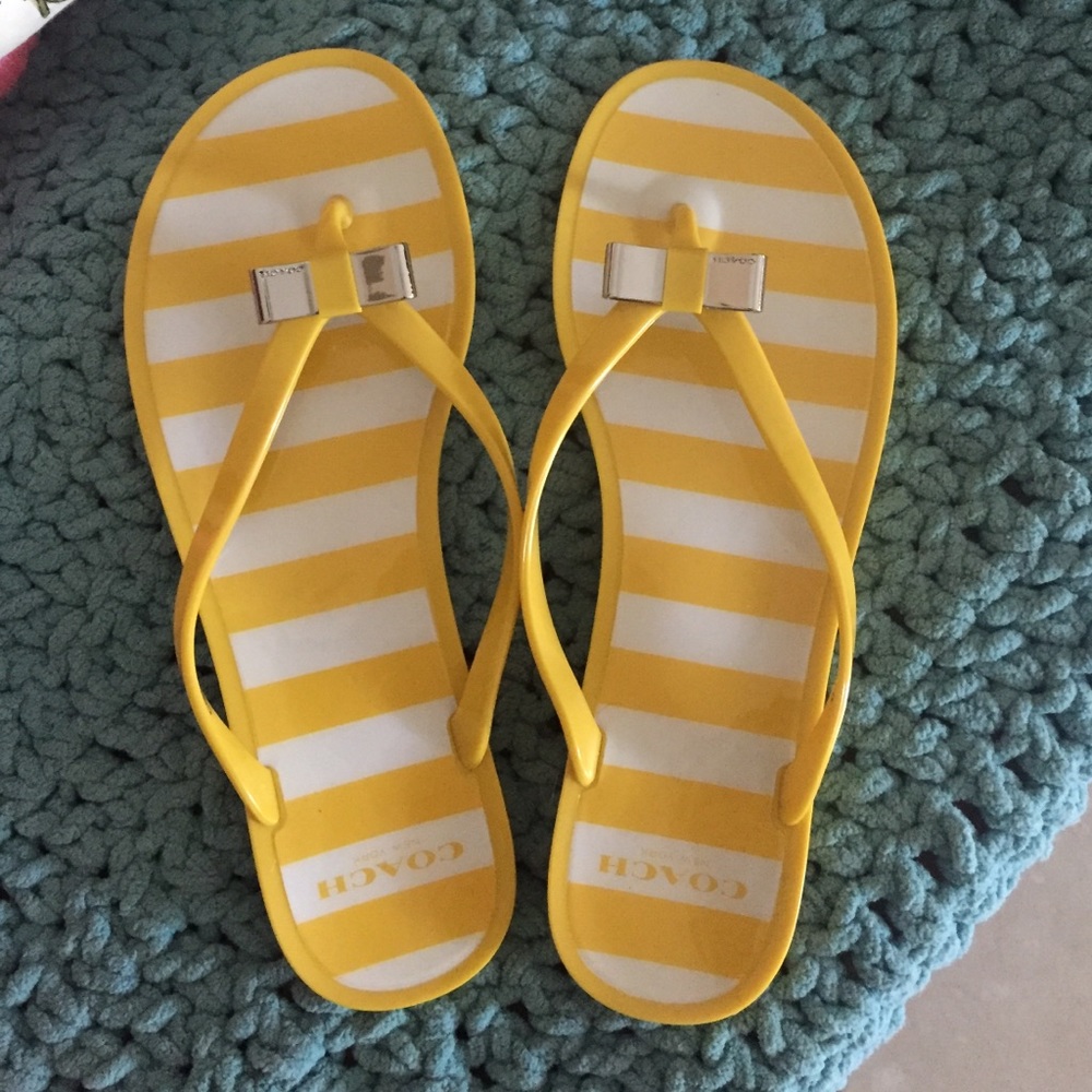 Coach yellow flip flops