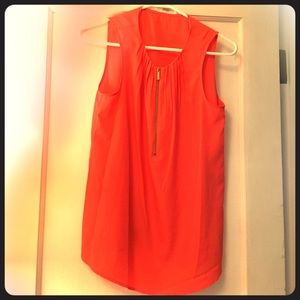 Orange sleeveless blouse