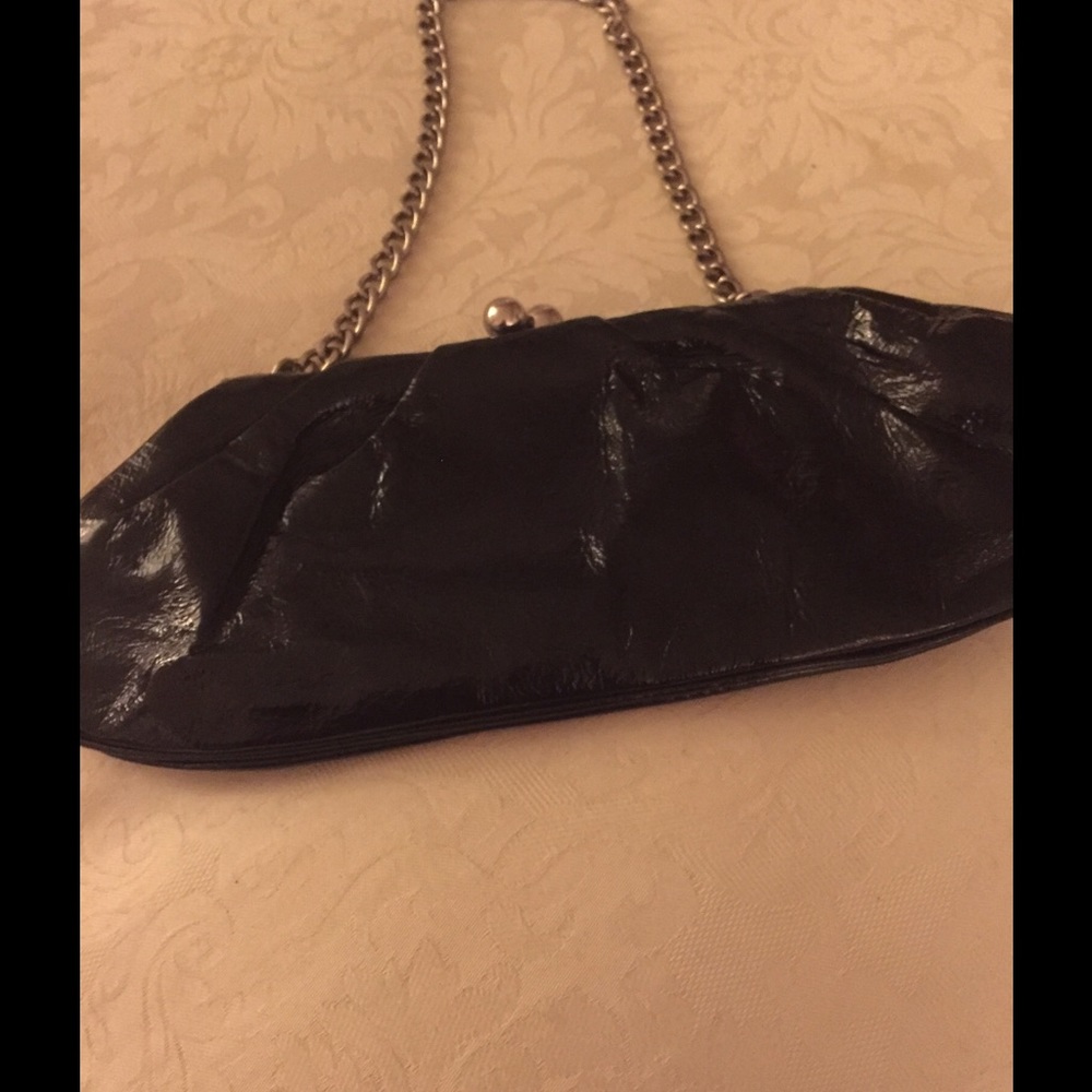 Club Monaco shoulder bag or clutch in black.