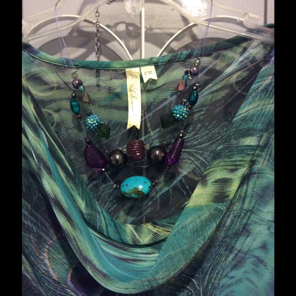 Sheer peacock blouse and matching necklace
