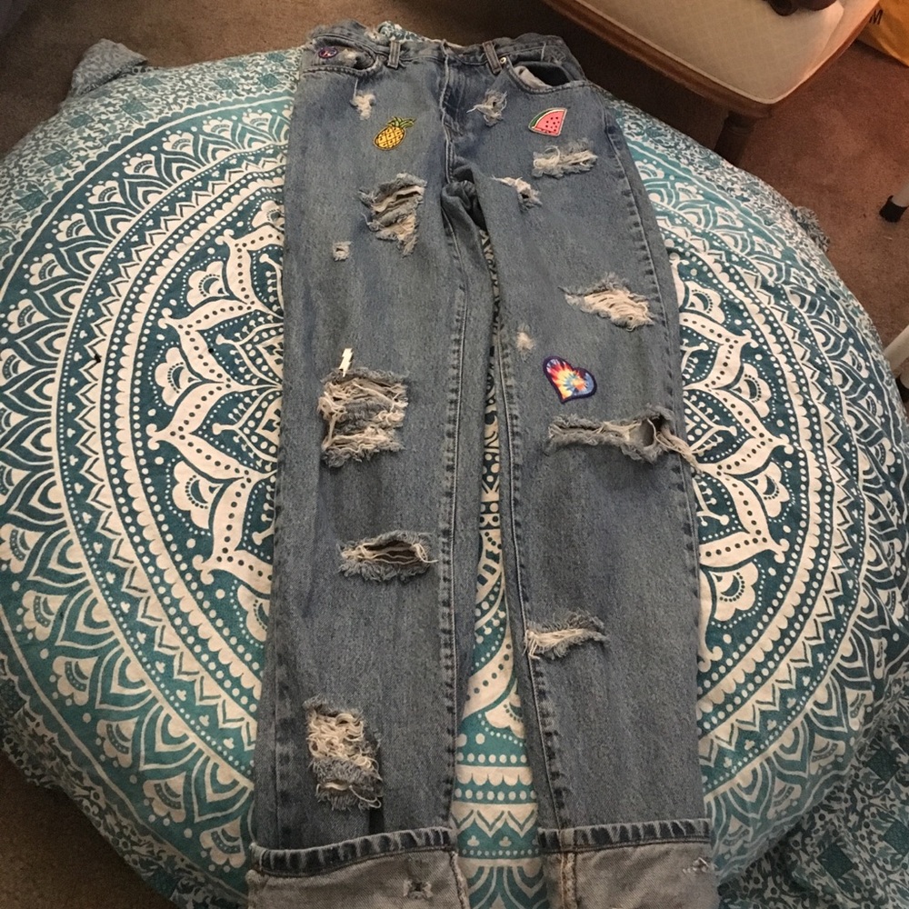Homemade high waisted ripped and patched jeans