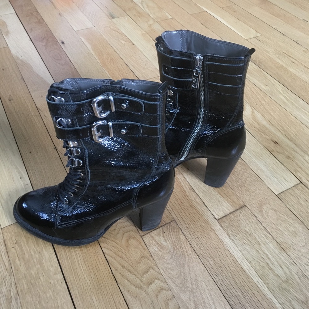 Patent leather KORS high heel bootie w buckles