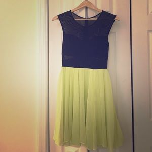 Short fun dress, no sleeves, sheer shoulders