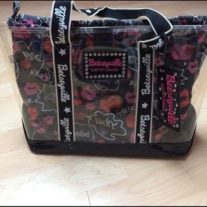 Clear plastic Betseyville handbag.