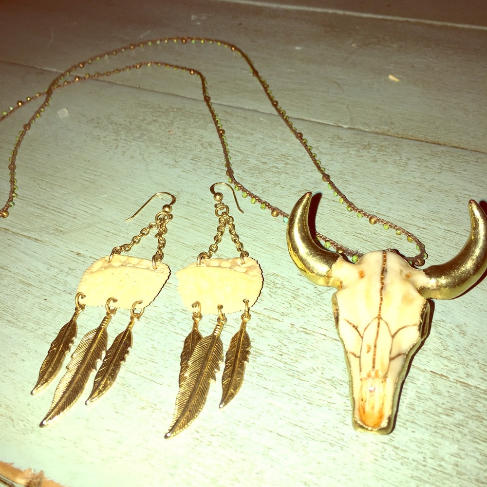 Feather earrings and bull necklace