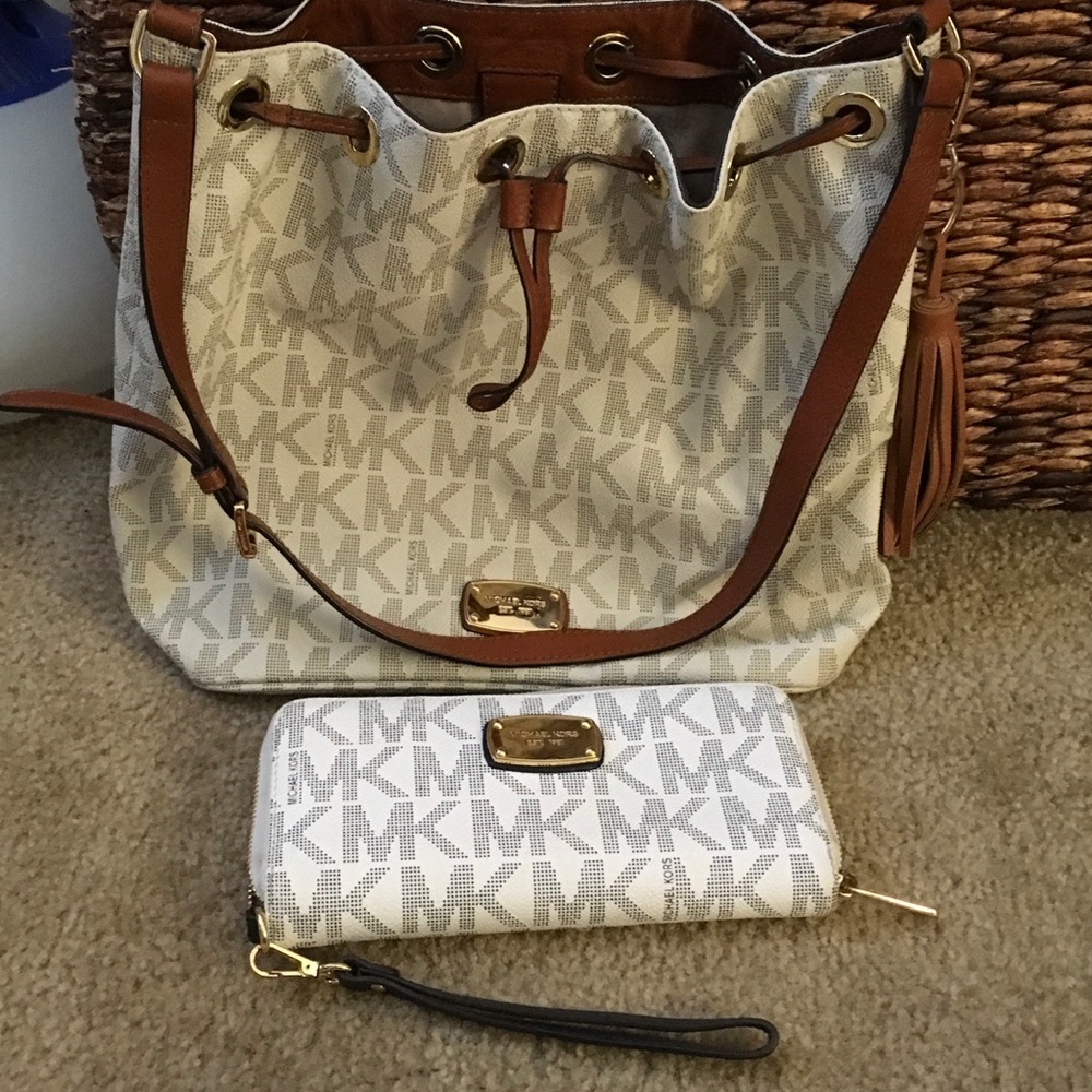 Authentic Michael Kors drawstring purse and wallet