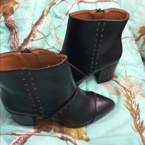 Report women's black boots with studs