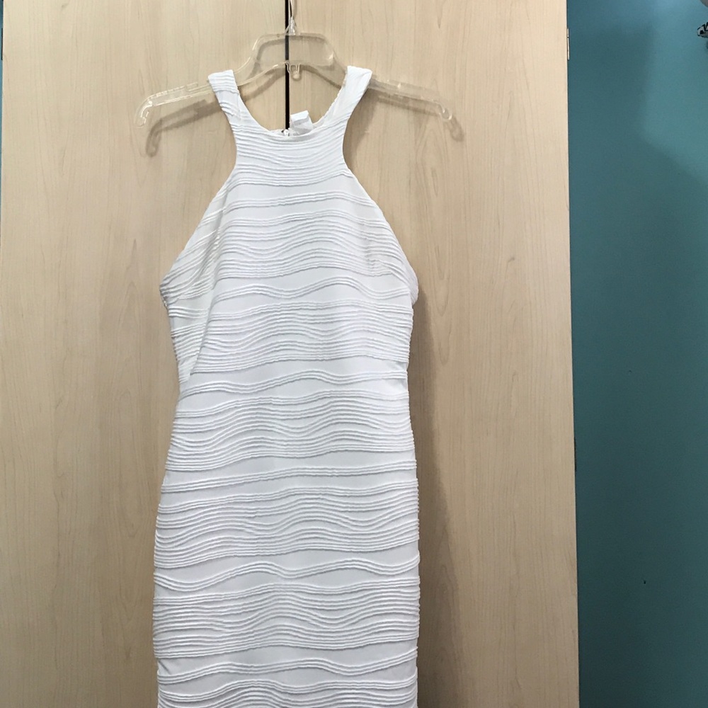 White day dress with a wrapped ruched pattern