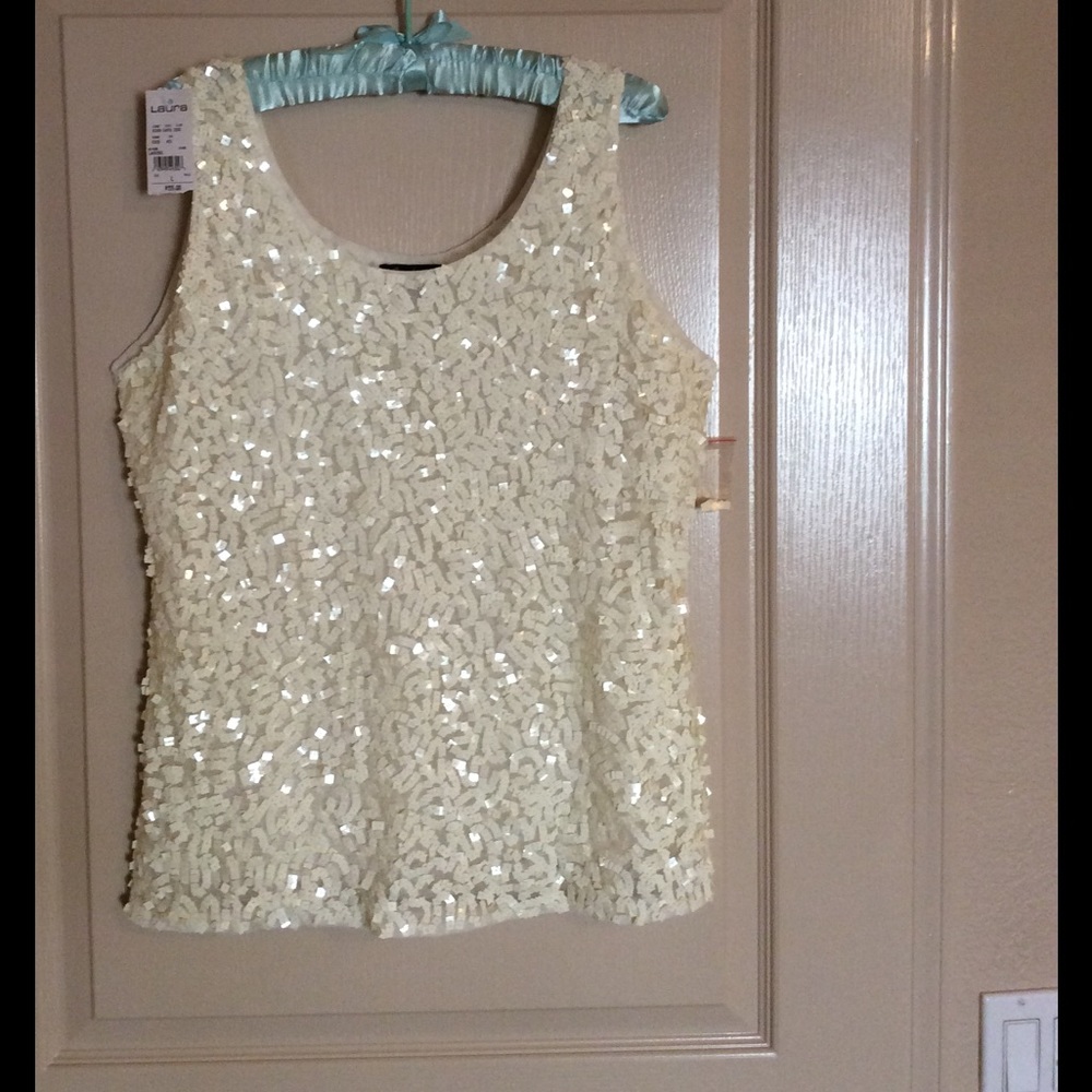 Cream color sequined tank top.