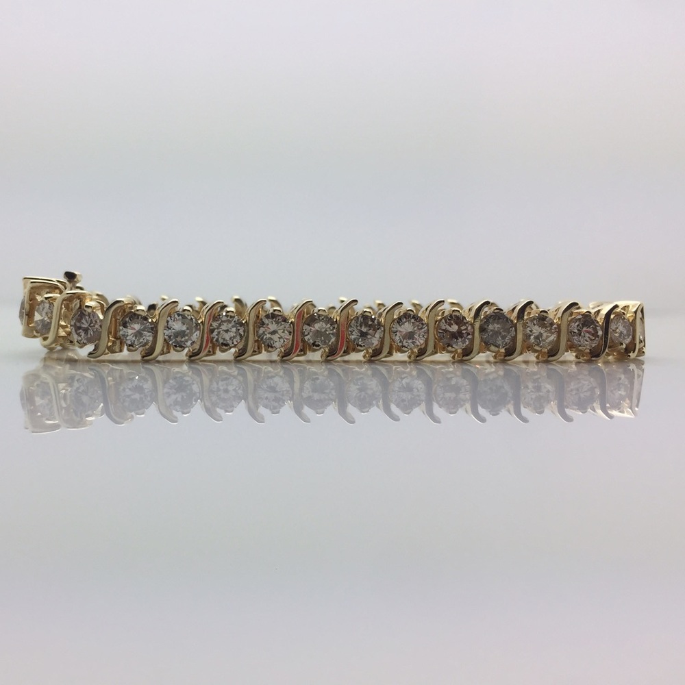 Tennis bracelet (8.75 ct.) set in 14k yellow gold