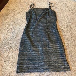 Black mini dress with small hole in seam