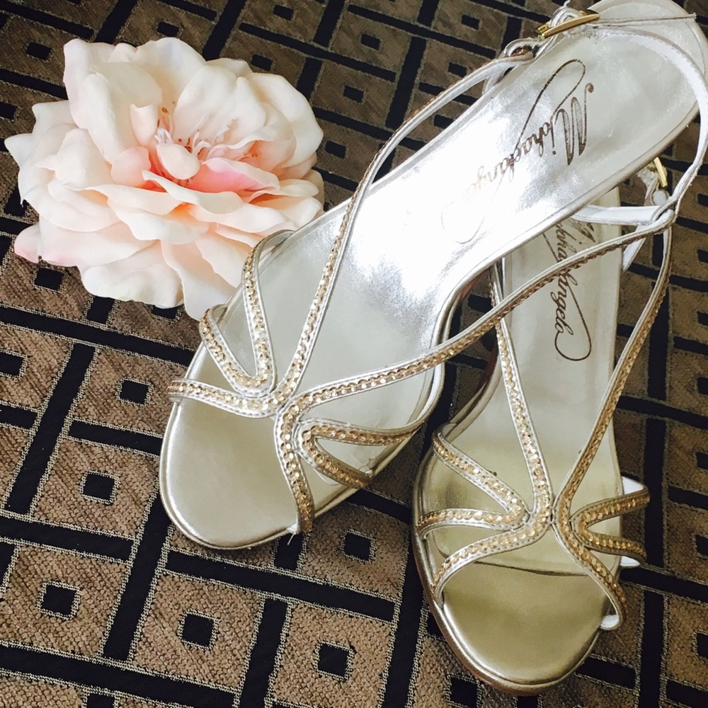 Michaelangelo strap sandals.