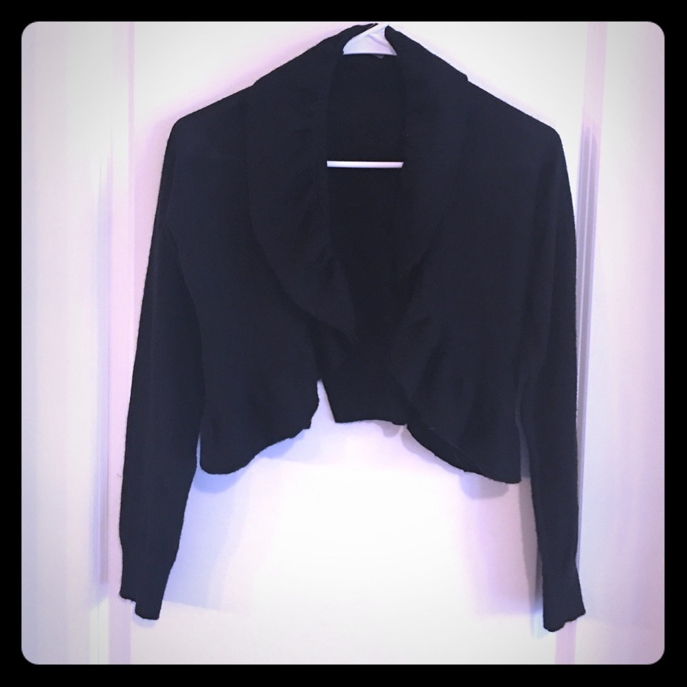 Open front sweater.