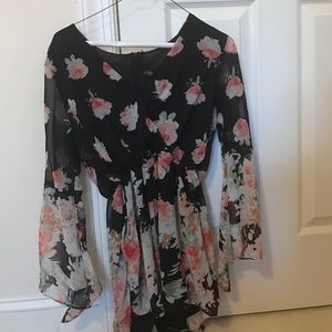 Black and floral long sleeve romper