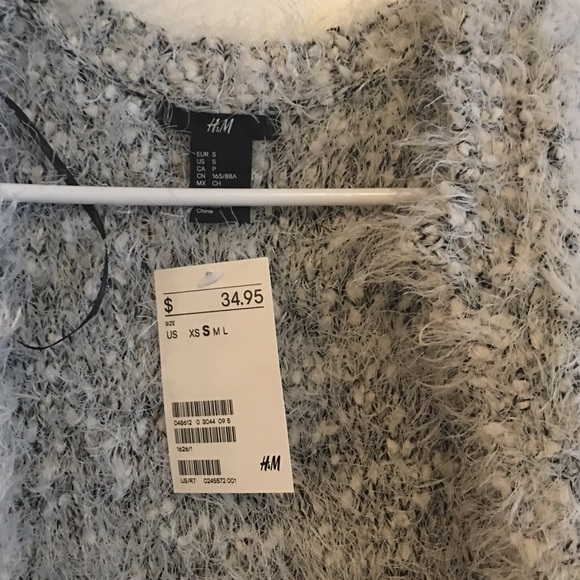 Long sleeveless sweater - Picture 2 of 3