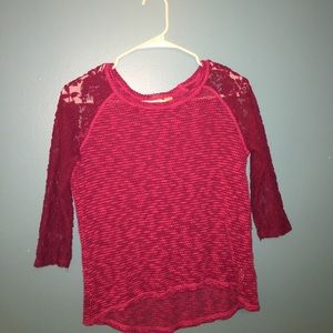 Pink shirt with medium length sleeves