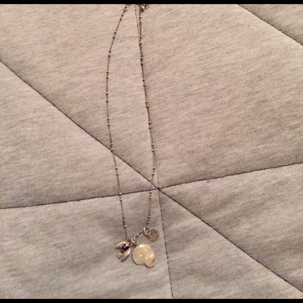 Bird/ rock necklace