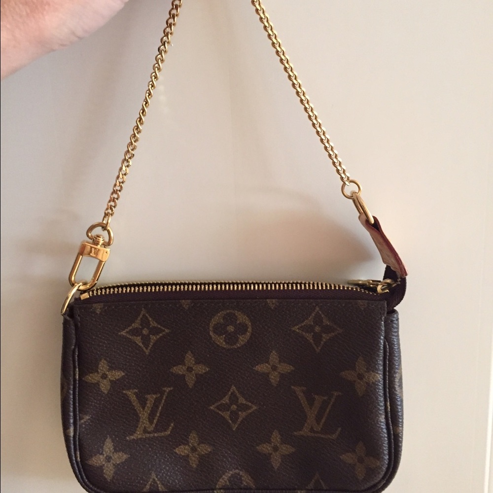 Authentic Louis Vuitton Monogram Mini Pochette