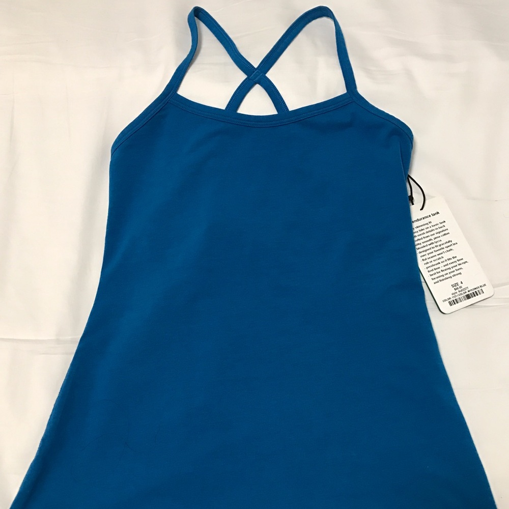 NWT.  Nancy Rose Endurance Tank. Size 4.