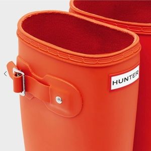 Hunter rain boots.  Orange