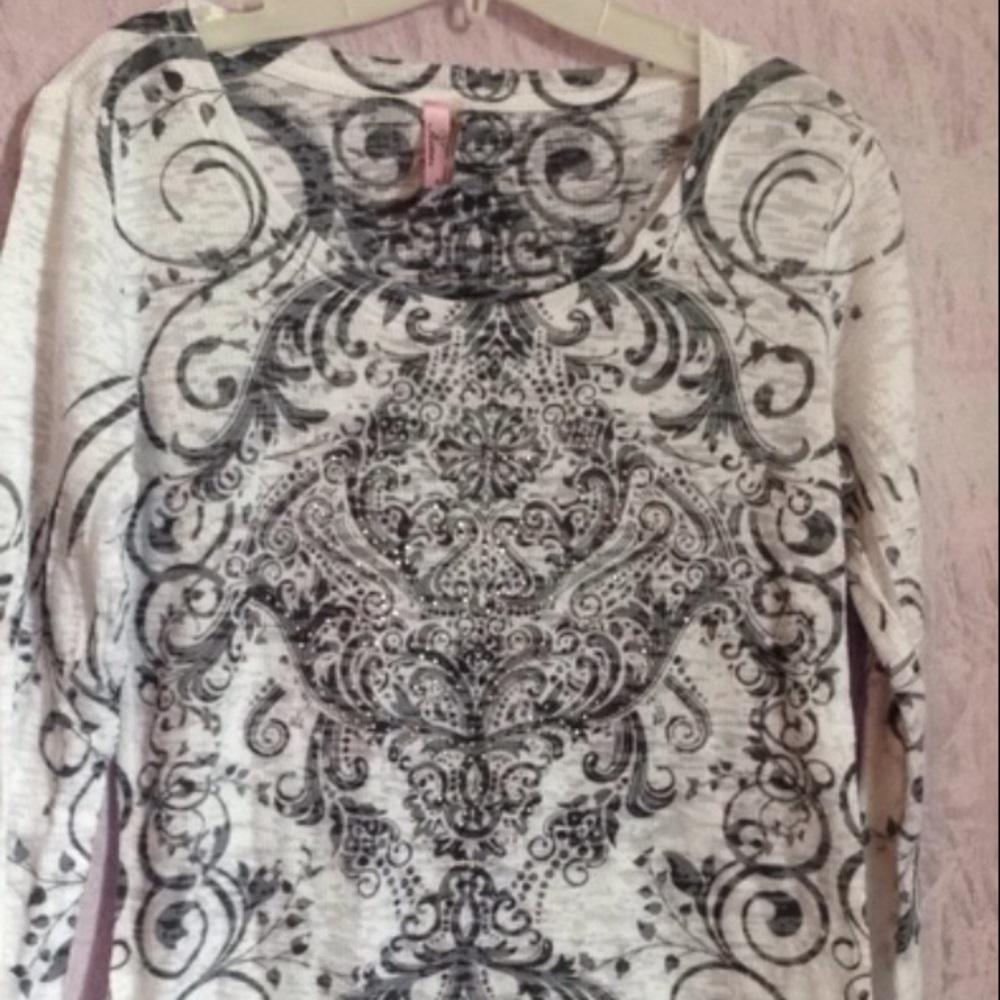 White and black design shirt