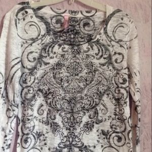 White and black design shirt