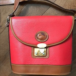 Dooley Bourke red purse. Is worn. $10.