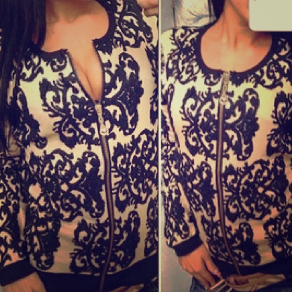 Black and cream jacket. Size small.