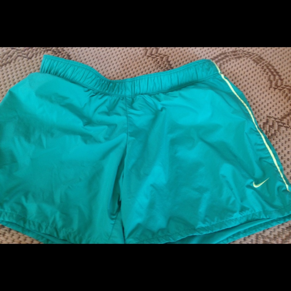 Green Nike shorts