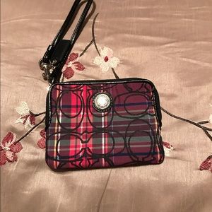 Small Coach wristlet ..... gently used