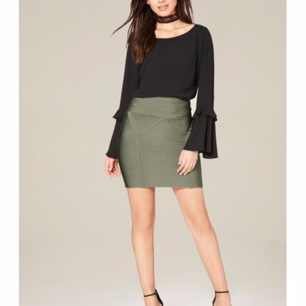 Green mini skirt by Bebe