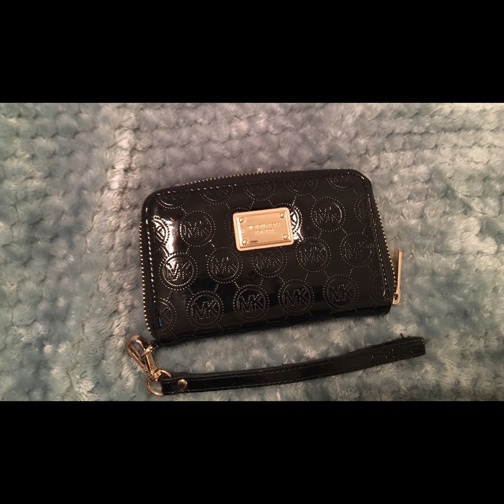 Like new Michael Kors wristlet.