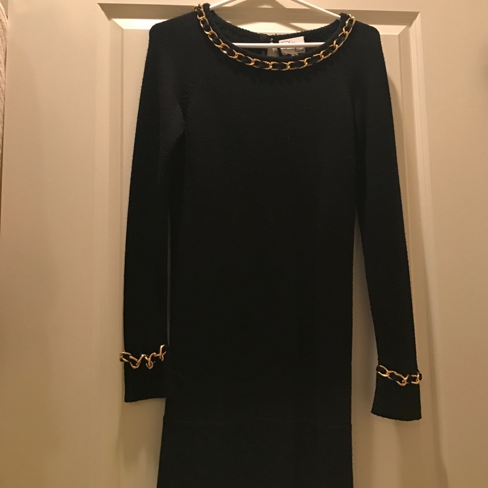 Black sweater dress with gold chain link detail