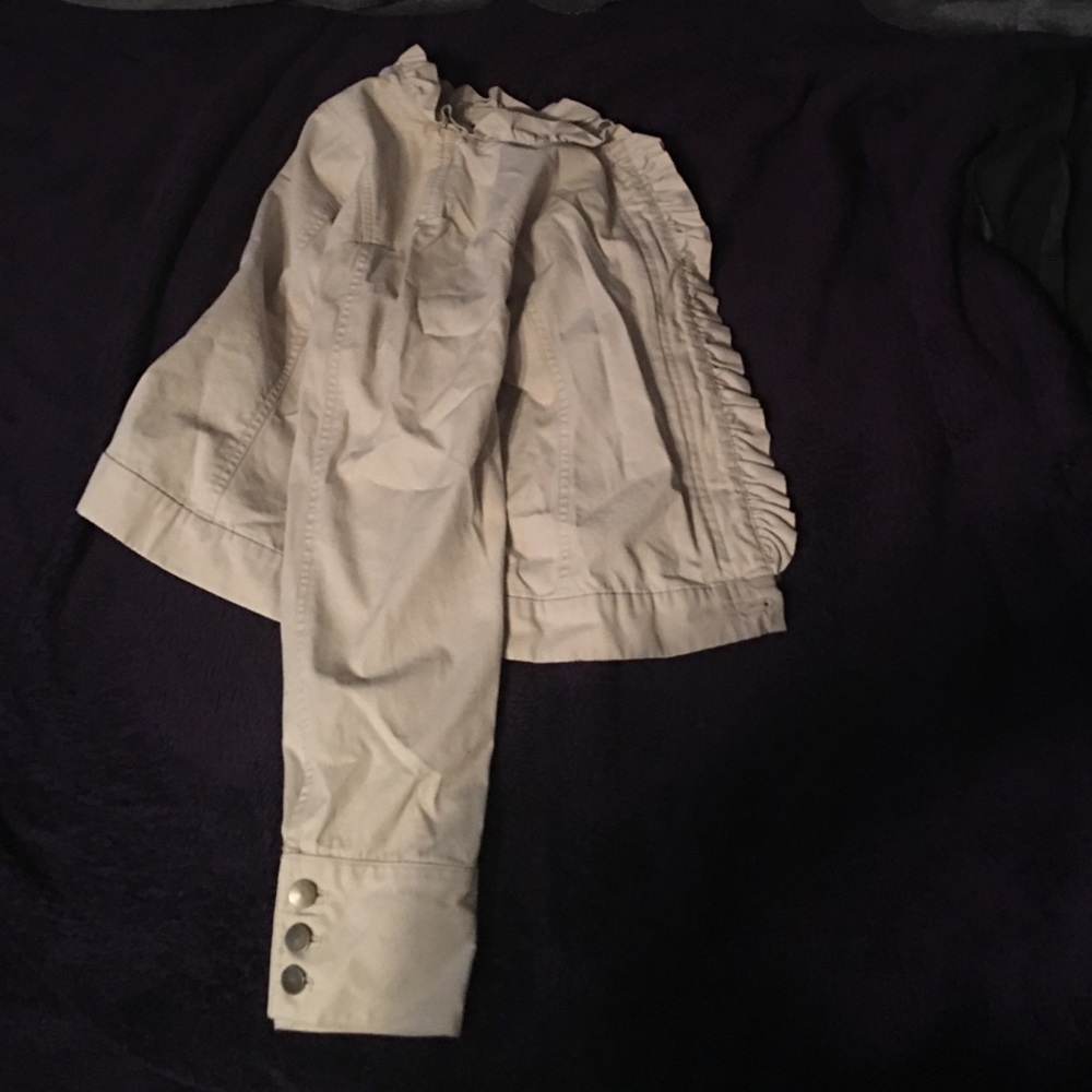 cream colored ruffle jacket