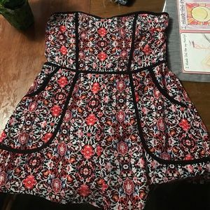 Romper with pockets.