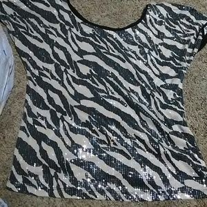 Off-shoulder sparkly shirt