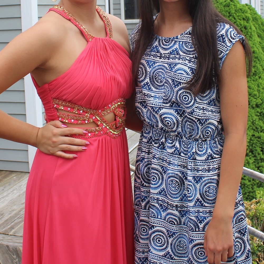Beautiful coral pink and gold prom dress