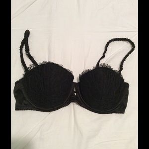 Black lace bra with keyhole middle.