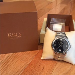 Men's Movado ESQ stainless steel watch.