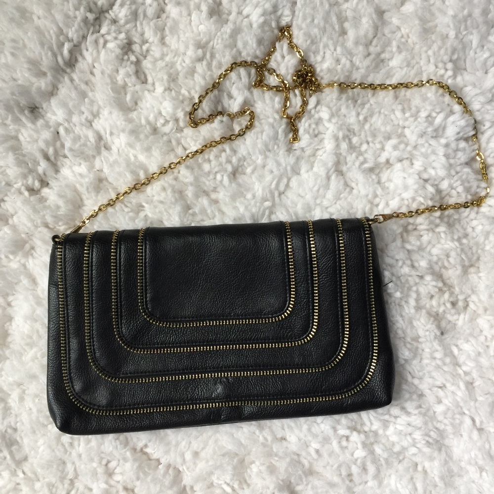 Black and gold cross body