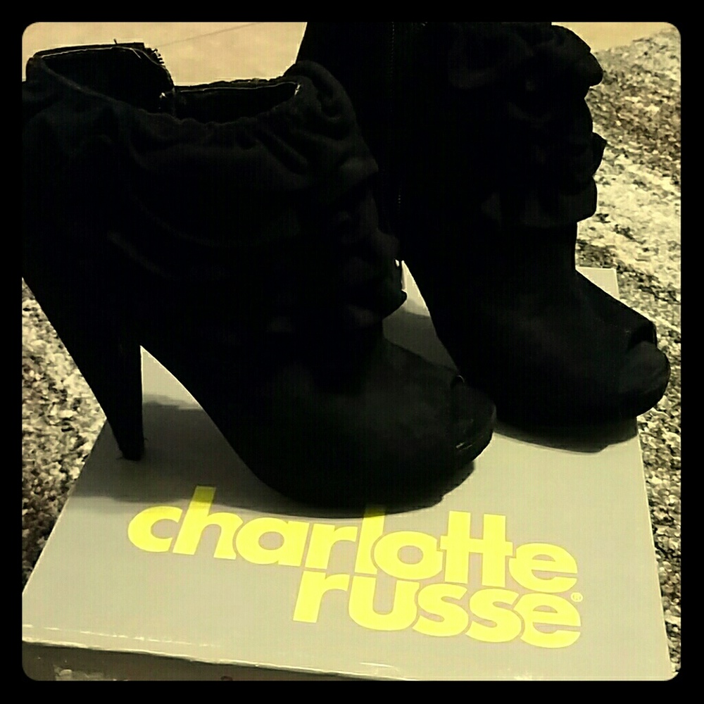 Black ruffled booties