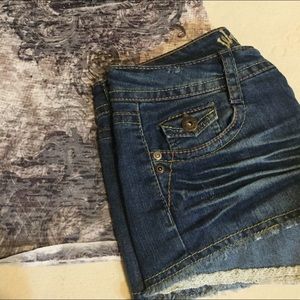 Lace trimmed jean shorts