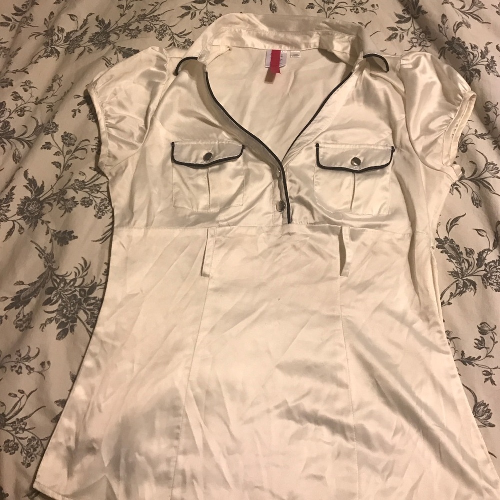 White a-line shirt.
