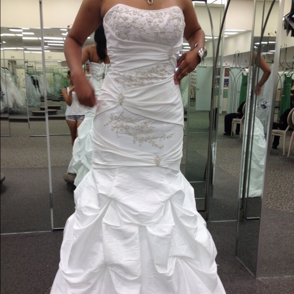 Wedding dress size 10 altered.