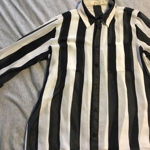 Stripped , button down blouse with pockets .