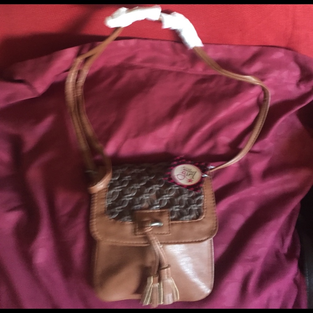 Dark brown cross body bag. Essential for wardrobe